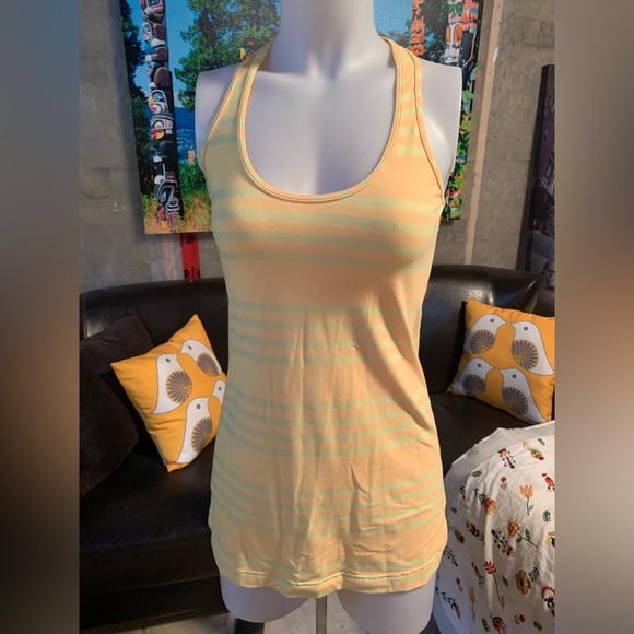 Two tone yellow Lululemon tank. 15” pit to pit. Great condition. - Picture 1 of 4